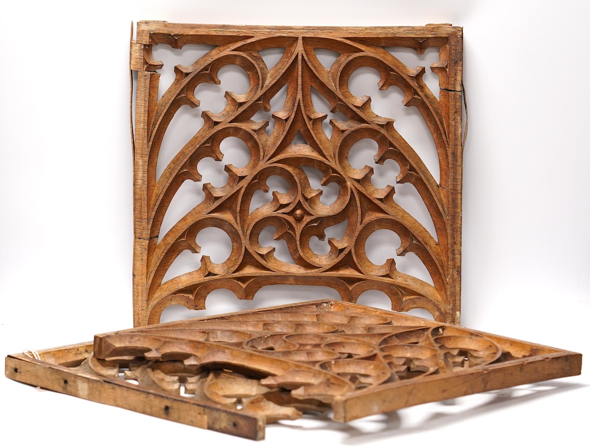 A set of three Victorian or earlier gothic carved oak tracery panels, 37cm high. Condition - fair to poor, losses and cracking